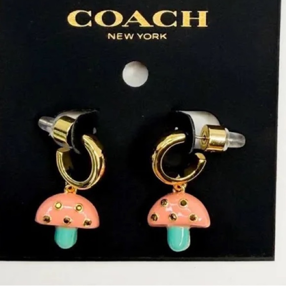 Authentic New on card. Coach Gold tone  Hoop Earrings with Mushroom charms.